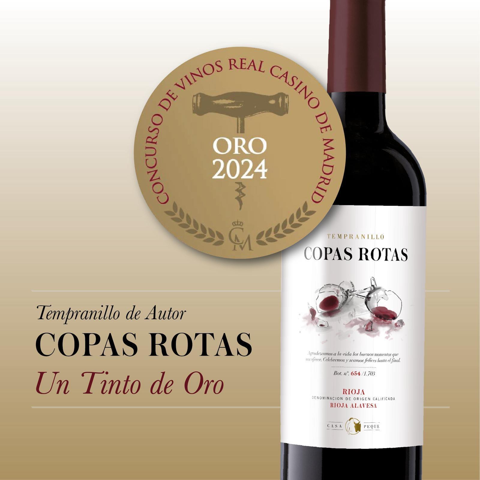 Botella de copas rotas